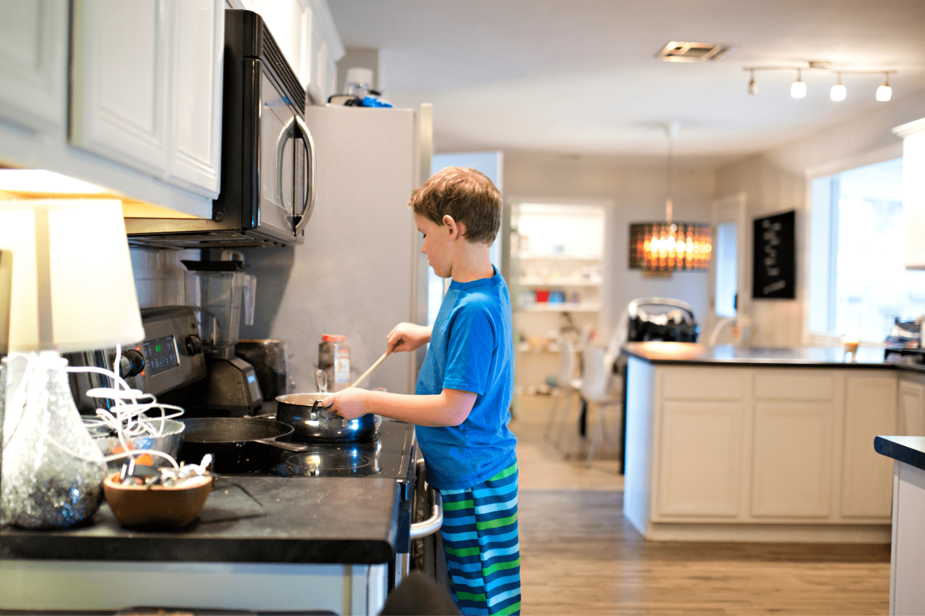 Young boy cooking